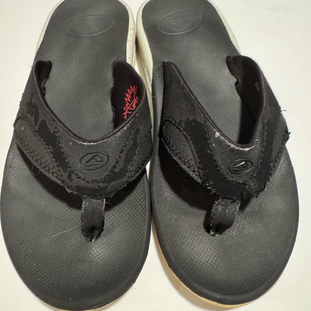 Reef Black bottle opener Flip-Flops